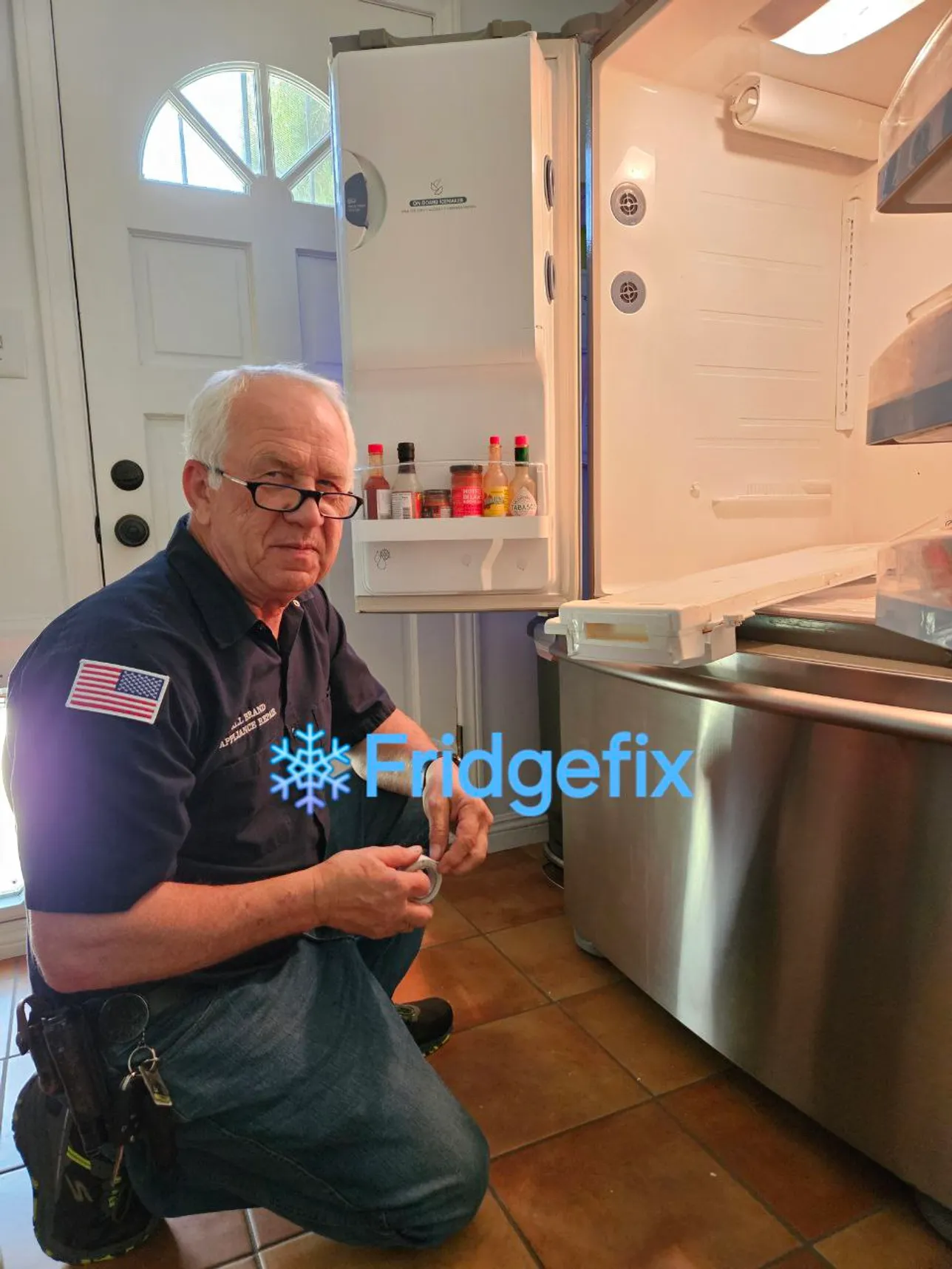 One of our technicians, repairing a freezer